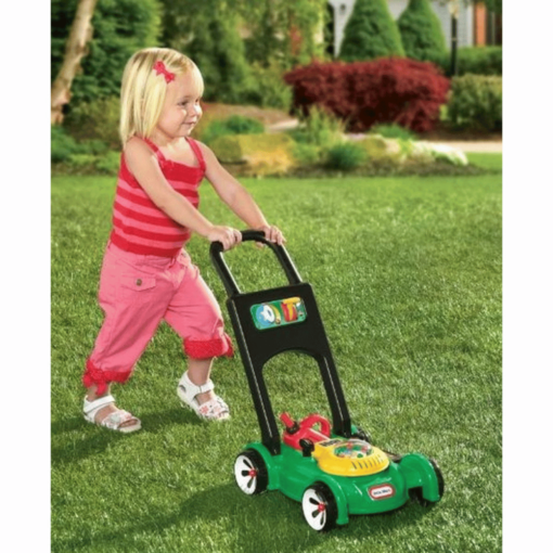 Little Tikes lawnmower playing